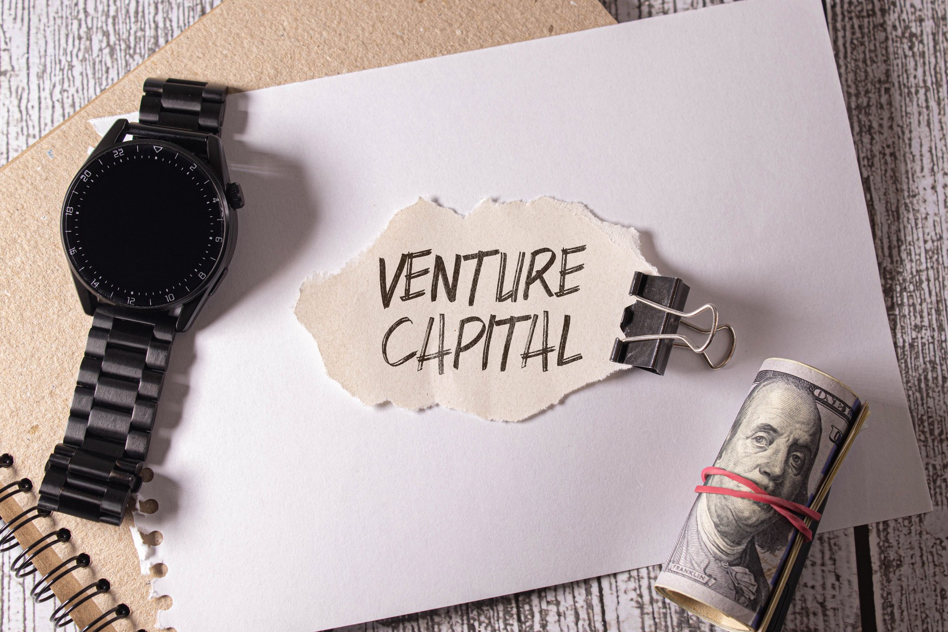 Concept words VC venture capital on white note.